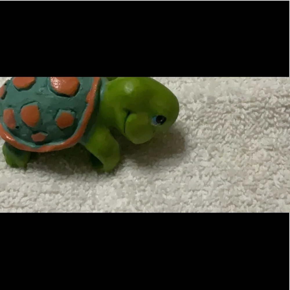 Green Turtle and Blue Gnome Figurine Set plant or shelve hangers.